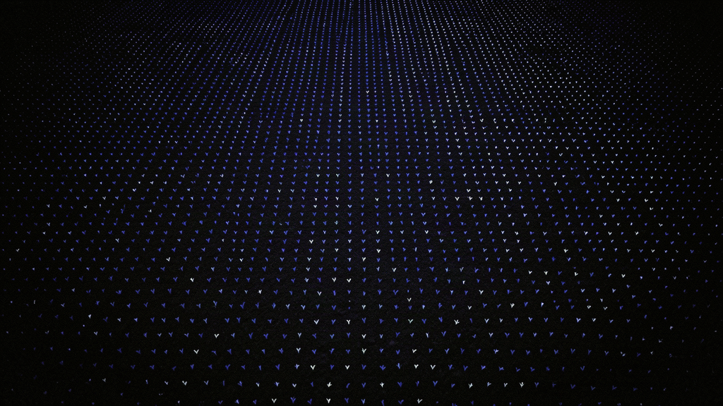 A dark digital garden at night: a dense grid of tiny indigo and pale lights like seeds planted in soil.